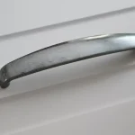 2495_160 fém bútorfogantyú, nikkel antik színű, 160 mm furattávval Legkelendőbb