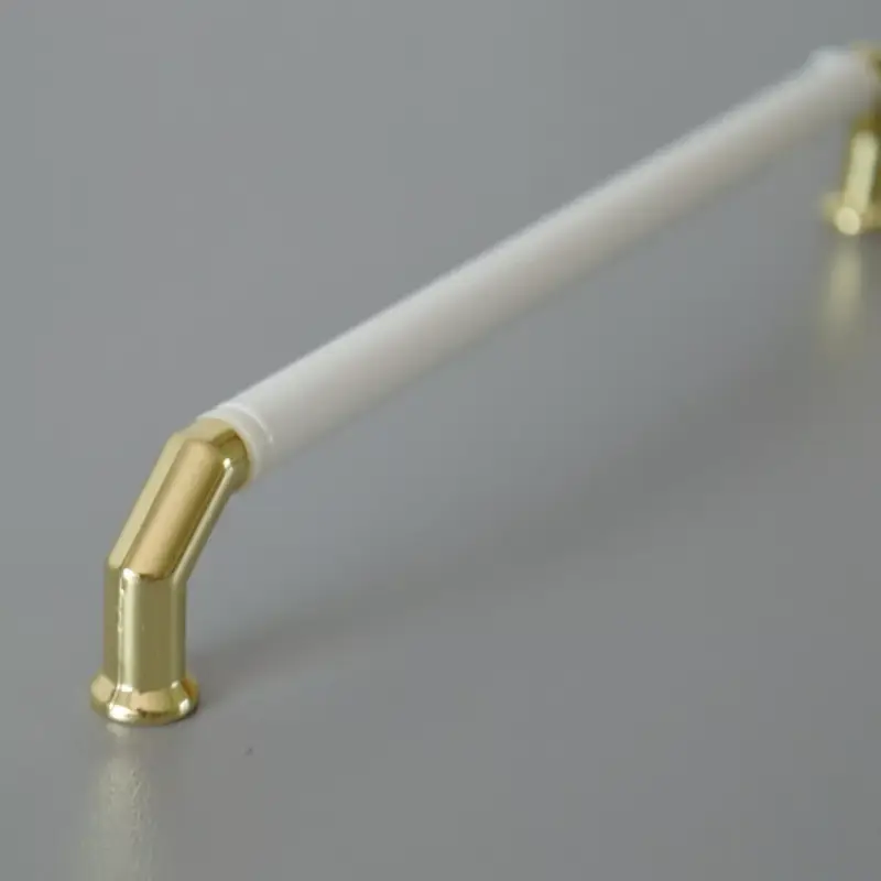 Árengedmény Metall-Kunststoff-Möbelgriff, Farbe gold-weiß, Bohrung 160 mm