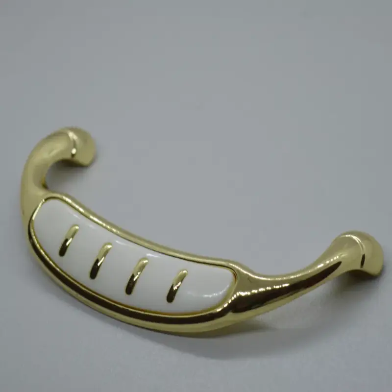 Árcsökkenés Metall-Kunststoff-Möbelgriff, Farbe gold-weiss, Bohrung 96 mm