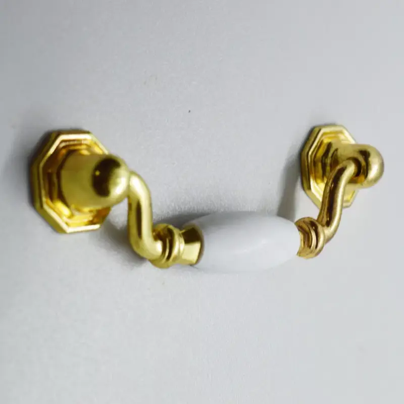 Azonnal elérhető Möbelgriff in der Farbe Weiß-gold , Material Metall-Kunststoff